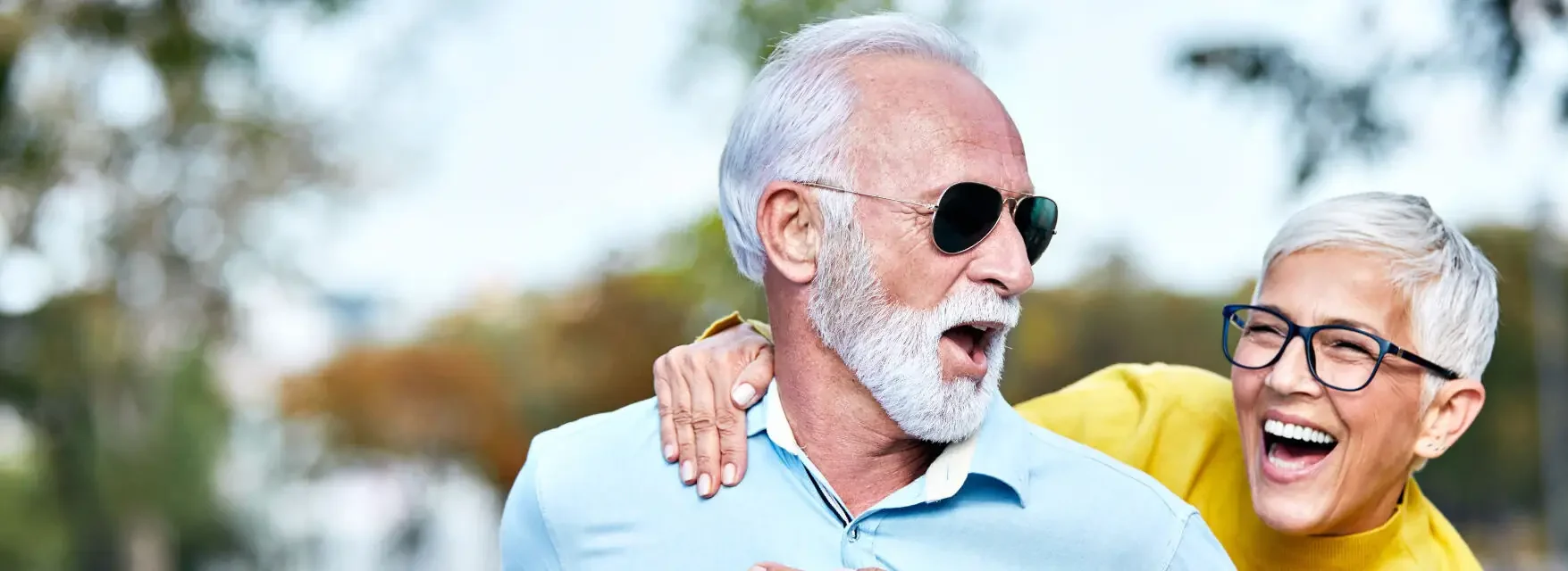 portrait of happy smiling senior couple outdoors